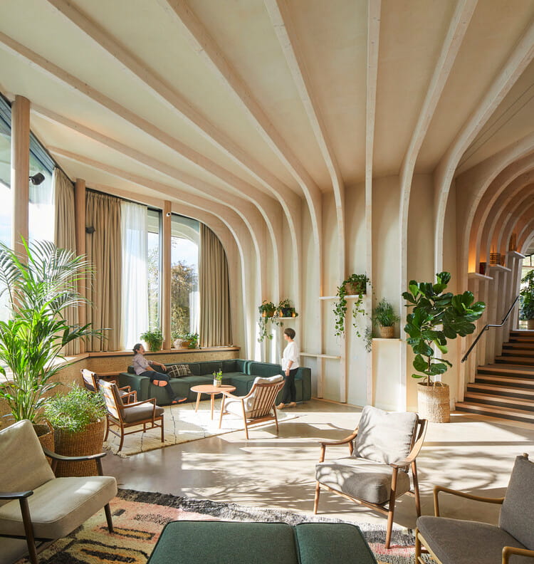 Modernist living room with curved ceiling before AI image upscaling
